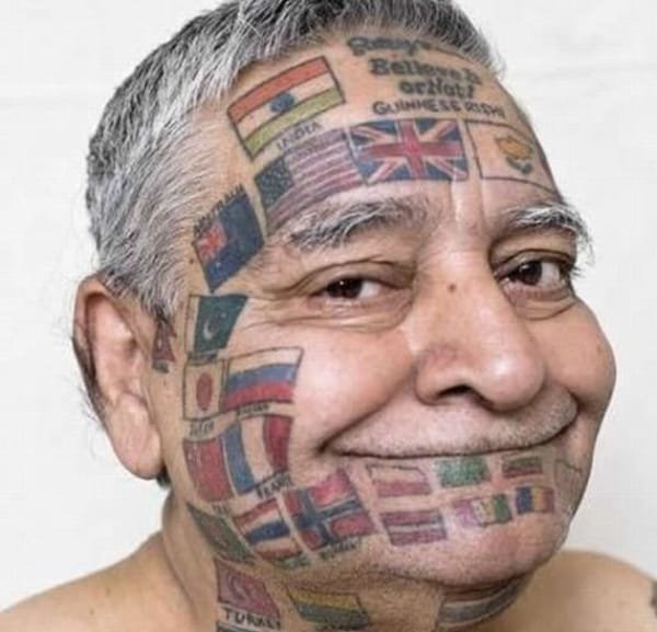 点击大图看下一张：面部个性纹身花体英文字脸部传统风格纹身图案