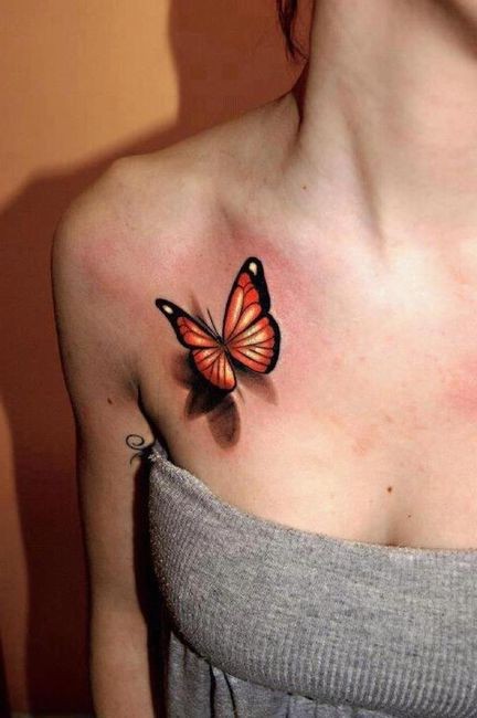 点击大图看下一张：性感美女胸部漂亮的3D蝴蝶纹身图片