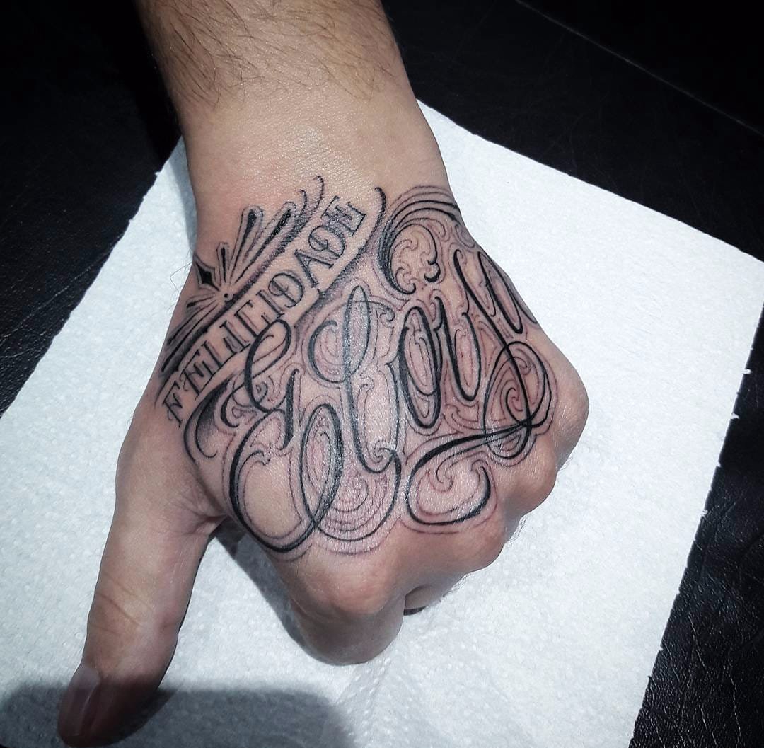 点击大图看下一张:15款黑色象征自由纹身花体英文字纹身手字母图案