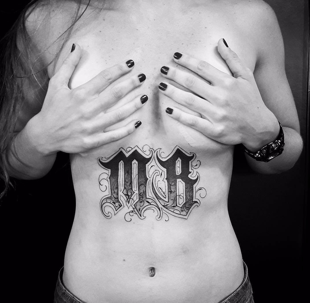 点击大图看下一张:15款黑色象征自由纹身花体英文字纹身手字母图案