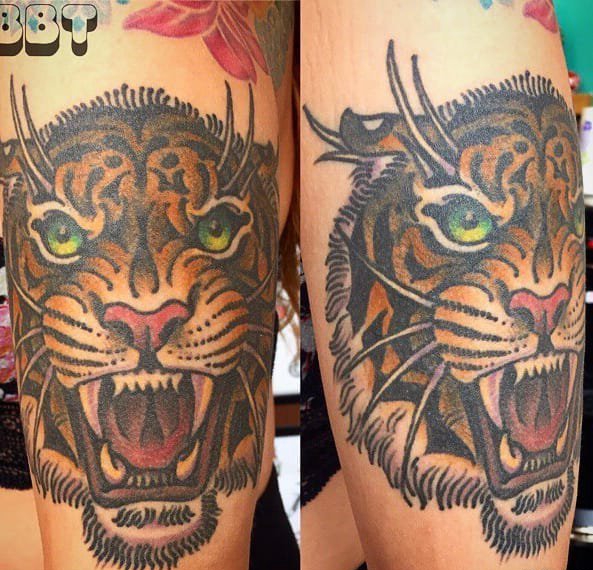 点击大图看下一张：彩色的凶猛的老虎头纹身动物图案纹身