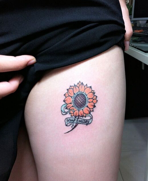 点击大图看下一张：性感美腿向日葵清新纹身图片