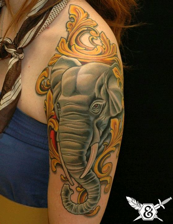 点击大图看下一张：女生手臂霸气的大象彩绘纹身图案