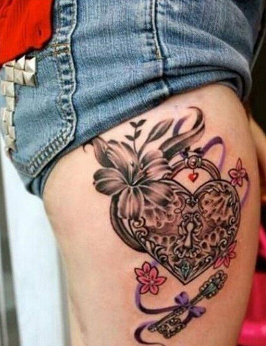 点击大图看下一张：女性腿部心形锁花朵纹身图案