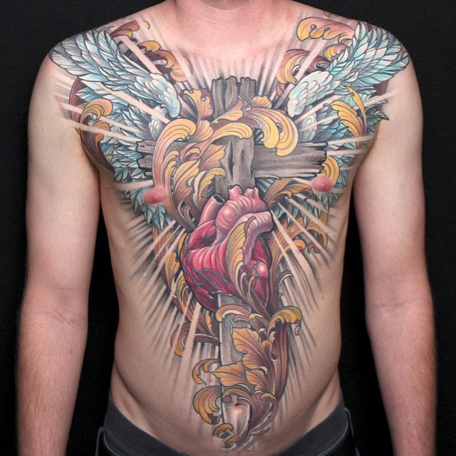 点击大图看下一张：十字架翅膀匕首彩绘胸部纹身图案