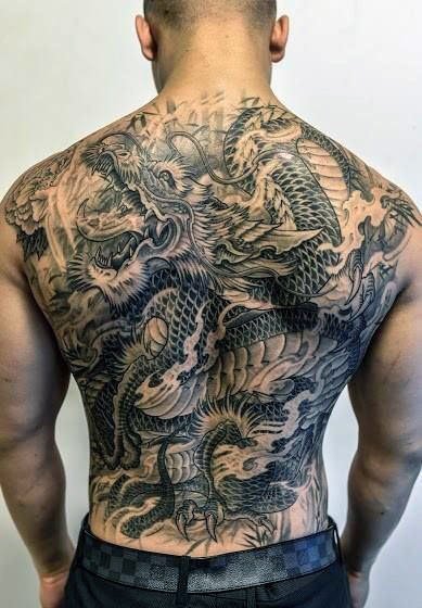 点击大图看下一张：24款男性霸气的满背大面积纹身图案欣赏
