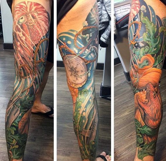 点击大图看下一张：多款腿部上凶猛的鳗鱼纹身图案