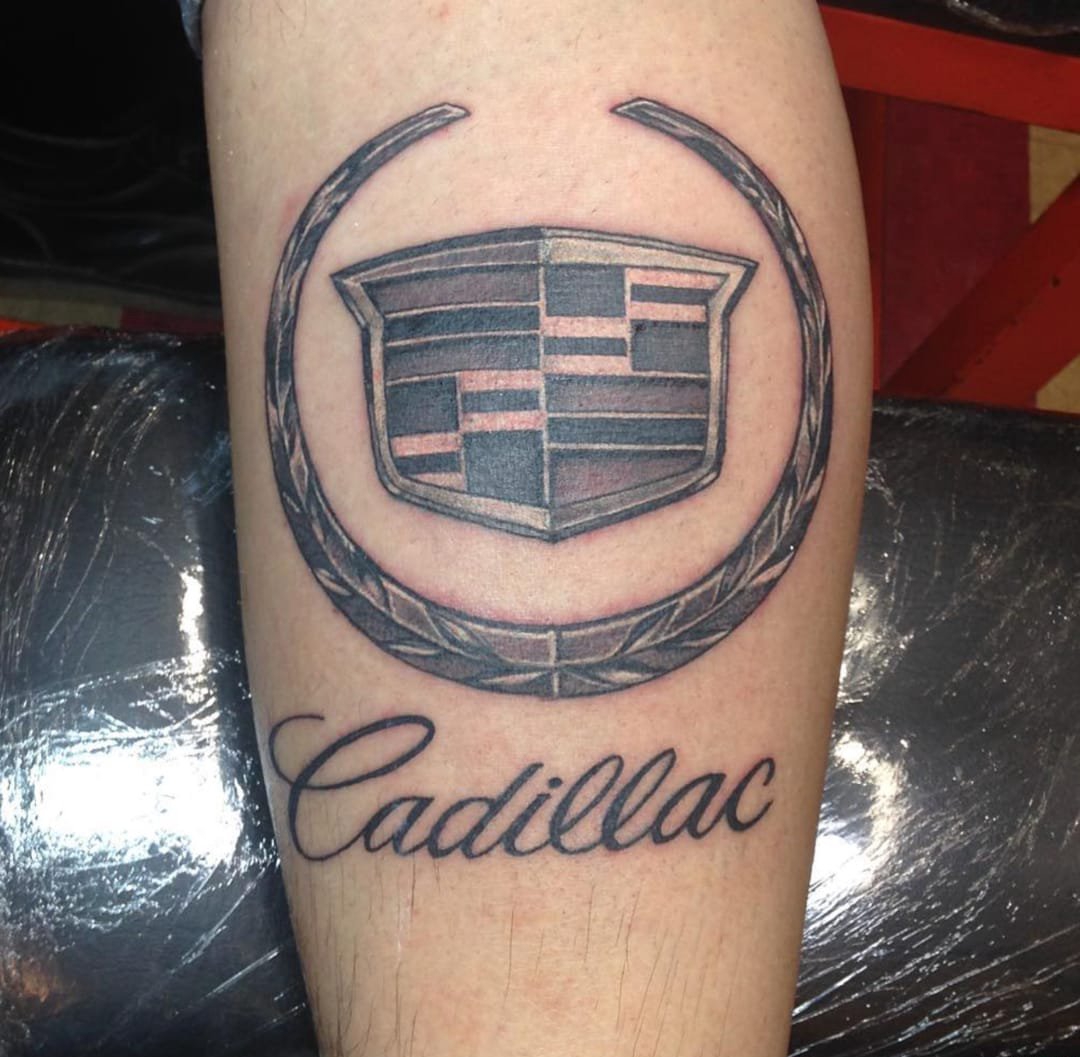点击大图看下一张：凯迪拉克标志纹身花体英文字汽车纹身图案大全