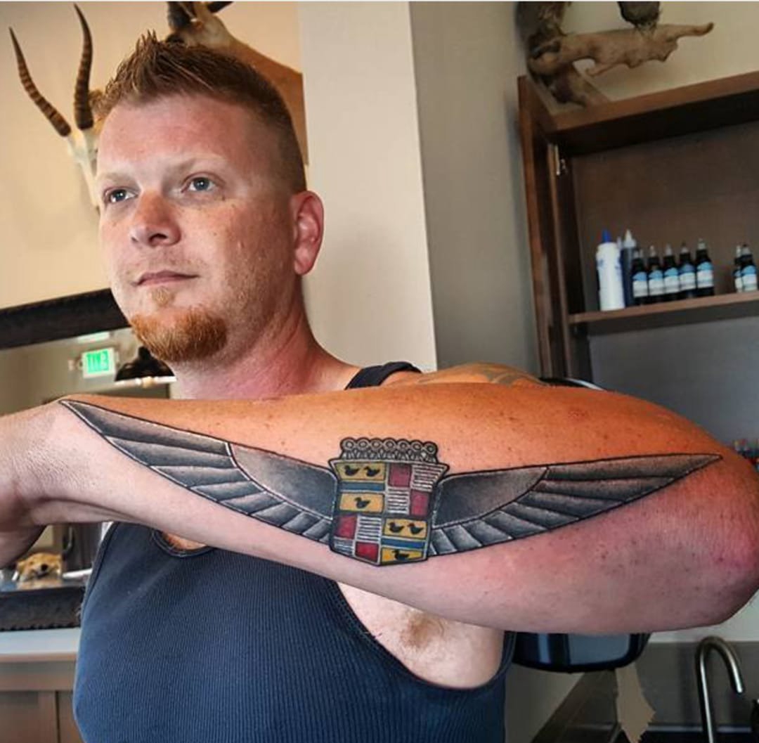 点击大图看下一张：凯迪拉克标志纹身花体英文字汽车纹身图案大全