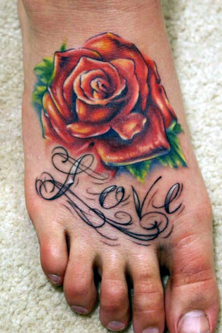 点击大图看下一张：脚背个性的花体英文和玫瑰纹身图案