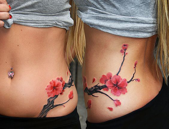 点击大图看下一张：腰部美丽的中国风梅花纹身图案