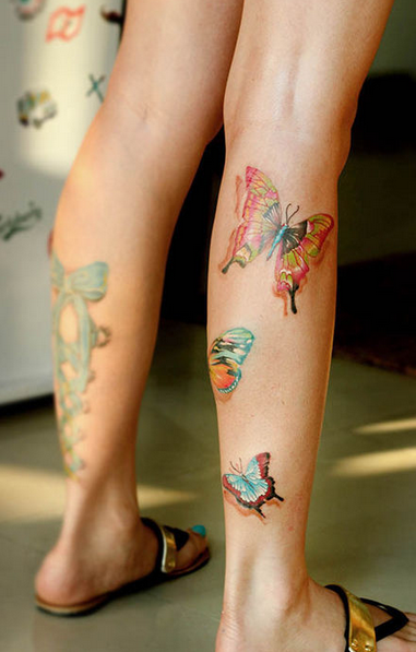 点击大图看下一张：小腿漂亮的3D蝴蝶纹身图案
