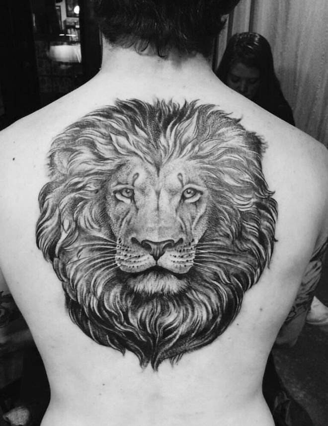 点击大图看下一张：简单个性线条纹身素描技巧狮子头纹身动物图案
