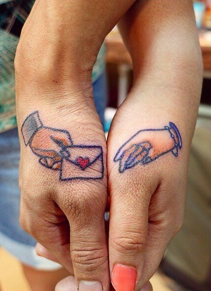 点击大图看下一张：情侣手腕定情信物纹身图案