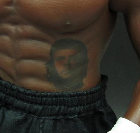 点击大图看下一张：拳王泰森腹部肖像纹身图案