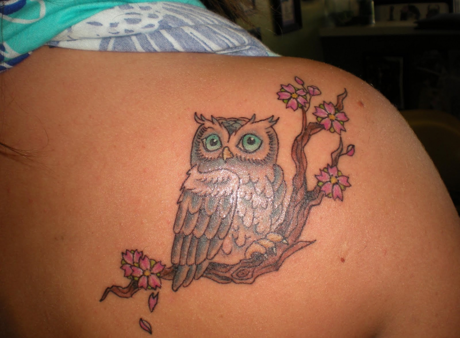 点击大图看下一张:有帅气或很萌很可爱的猫头鹰纹身图案欣赏