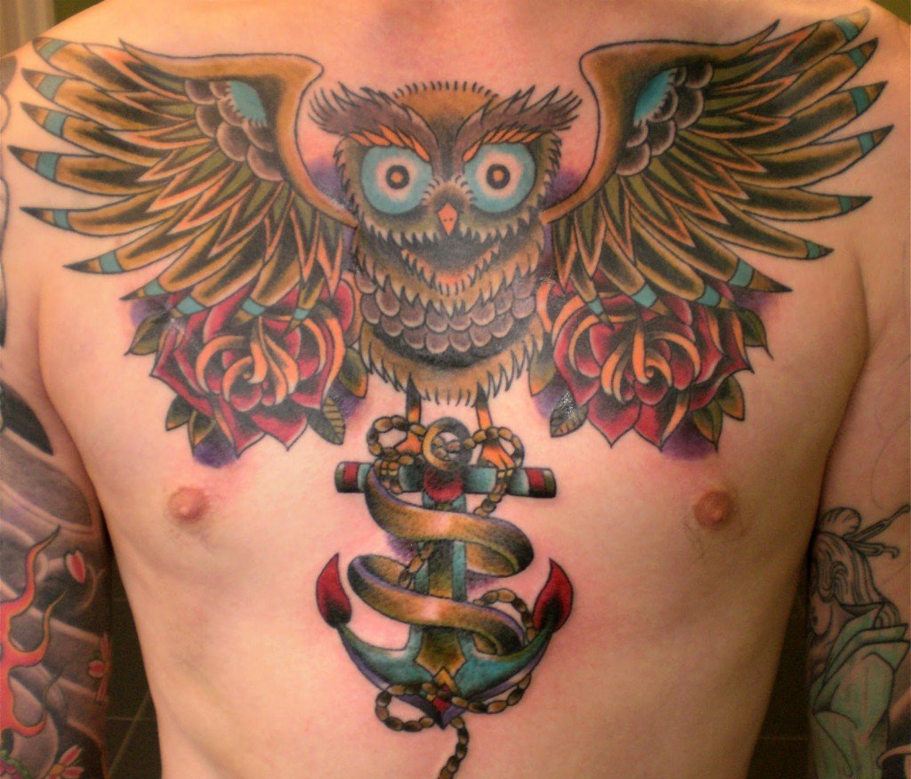 点击大图看下一张:有帅气或很萌很可爱的猫头鹰纹身图案欣赏