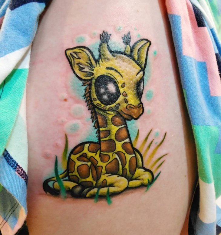 点击大图看下一张:多款可爱的动物长颈鹿纹身图案