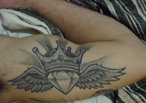 点击大图看下一张:纹身男女都会喜欢的漂亮的钻石纹身图案