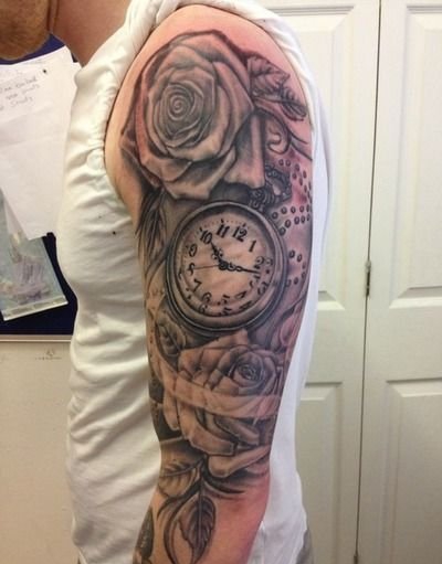 点击大图看下一张：钟表都可以制作成这么帅气的纹身图案