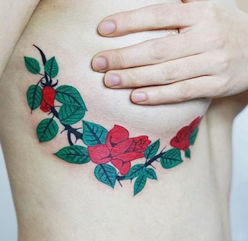 点击大图看下一张：漂亮的性感的玫瑰花纹身图案大全