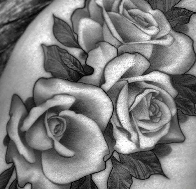 点击大图看下一张：漂亮的性感的玫瑰花纹身图案大全