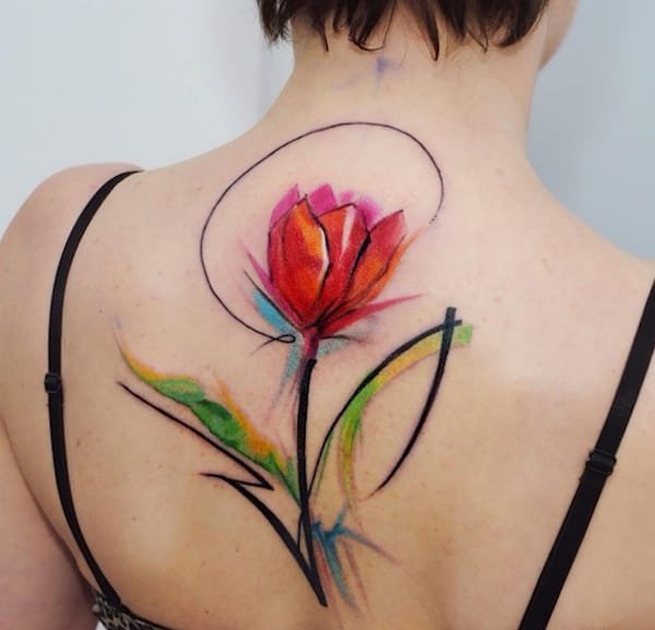 点击大图看下一张：女生中国风花卉泼墨纹身图案