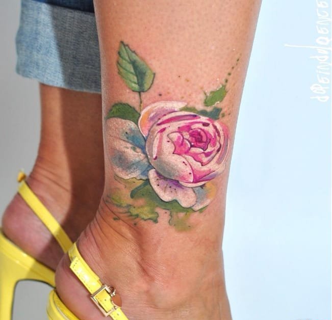 点击大图看下一张：女生中国风花卉泼墨纹身图案