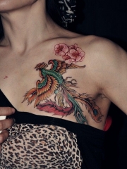 女性小臂漂亮的火凤凰花朵纹身图案