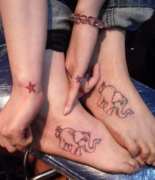 点击大图看下一张：个性情侣脚背星星和大象纹身图案