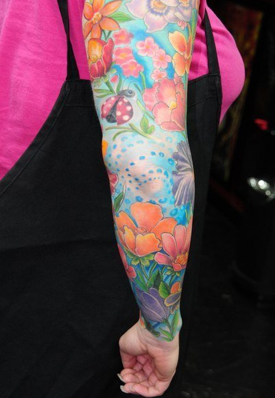 点击大图看下一张:彩色的植物藤花朵纹身动物满臂花臂纹身图案大全