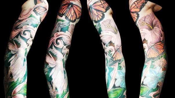 点击大图看下一张：彩色的植物藤花朵纹身动物满臂花臂纹身图案大全
