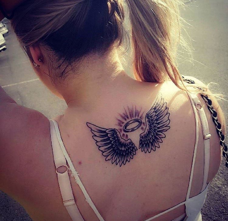 点击大图看下一张：女性黑色线条素描纹身守护天使翅膀纹身图案大全图片