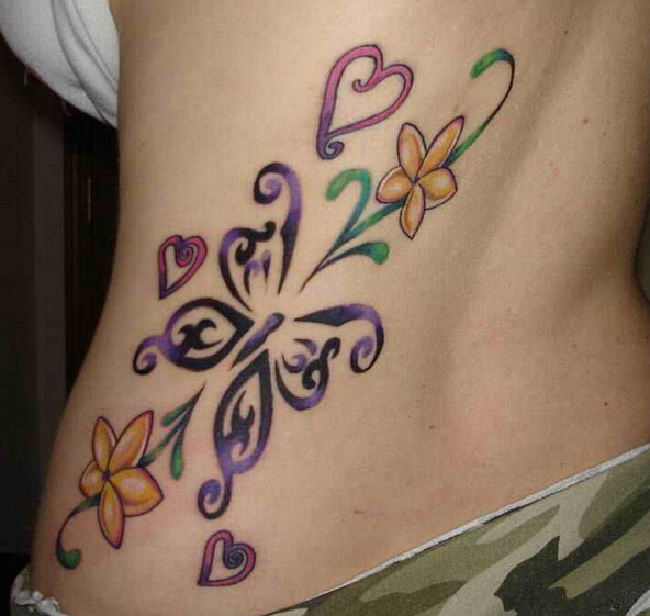 点击大图看下一张：女性腰部漂亮的蝴蝶心形花朵纹身图案