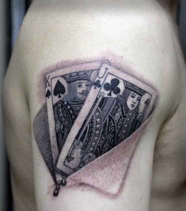 点击大图看下一张：男士手臂个性扑克牌纹身图案