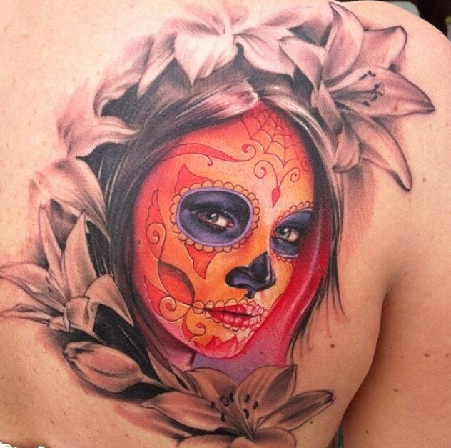 点击大图看下一张：背部超有个性的女鬼肖像纹身图案