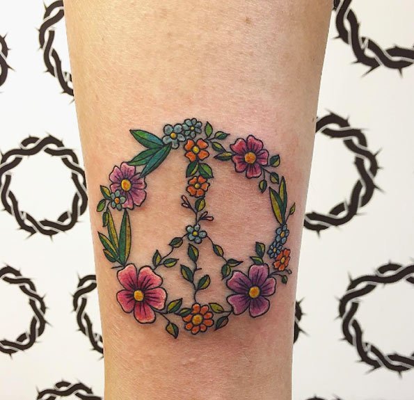 点击大图看下一张:女孩子喜爱的文艺风纹身图案