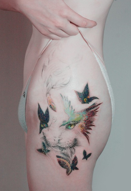 点击大图看下一张：臀部神秘的喵星人蝴蝶纹身图案