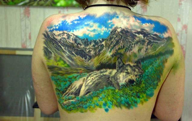 点击大图看下一张：彩色的手臂山水纹身花朵纹身风景大自然植物纹身图案