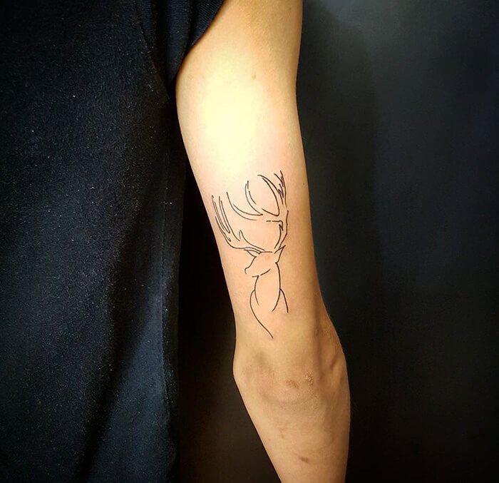 点击大图看下一张:男女都喜爱的可爱小动物纹身图案