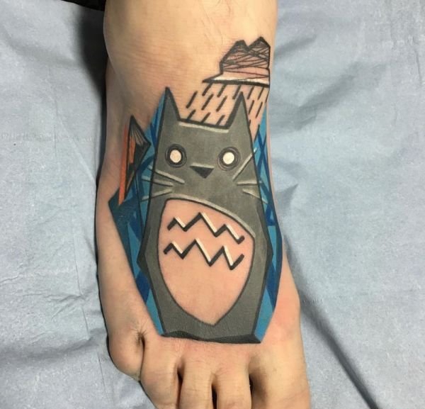 点击大图看下一张:男女都喜爱的可爱小动物纹身图案