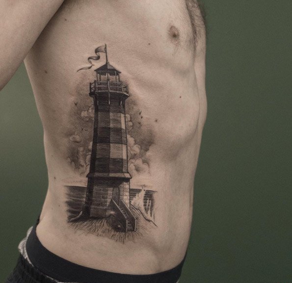 点击大图看下一张：男性黑色的简易纹身素描小灯塔纹身点刺技巧纹身图案