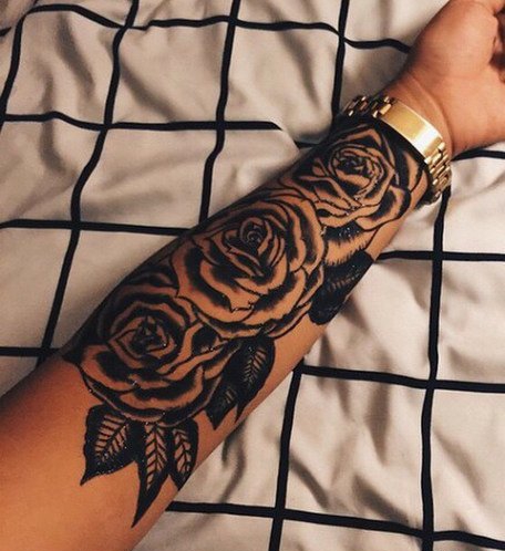 点击大图看下一张：女生手臂上纹身点刺技巧植物纹身素材花朵纹身图案