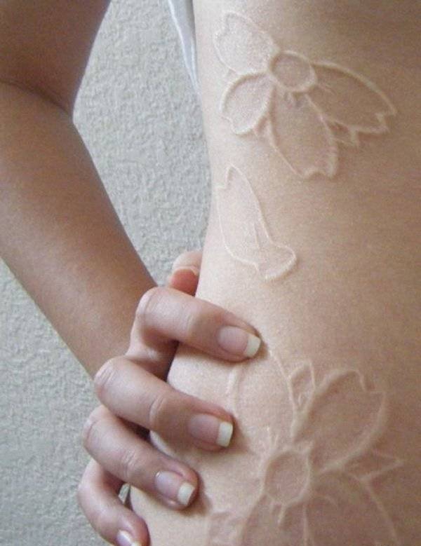 点击大图看下一张:一组女生喜爱的超美的白色隐形纹身图案