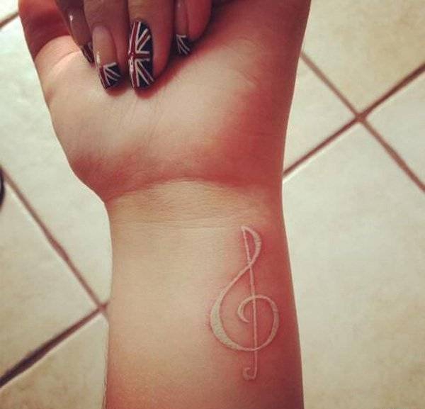 点击大图看下一张:一组女生喜爱的超美的白色隐形纹身图案