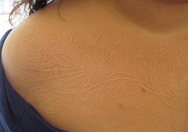 点击大图看下一张:一组女生喜爱的超美的白色隐形纹身图案