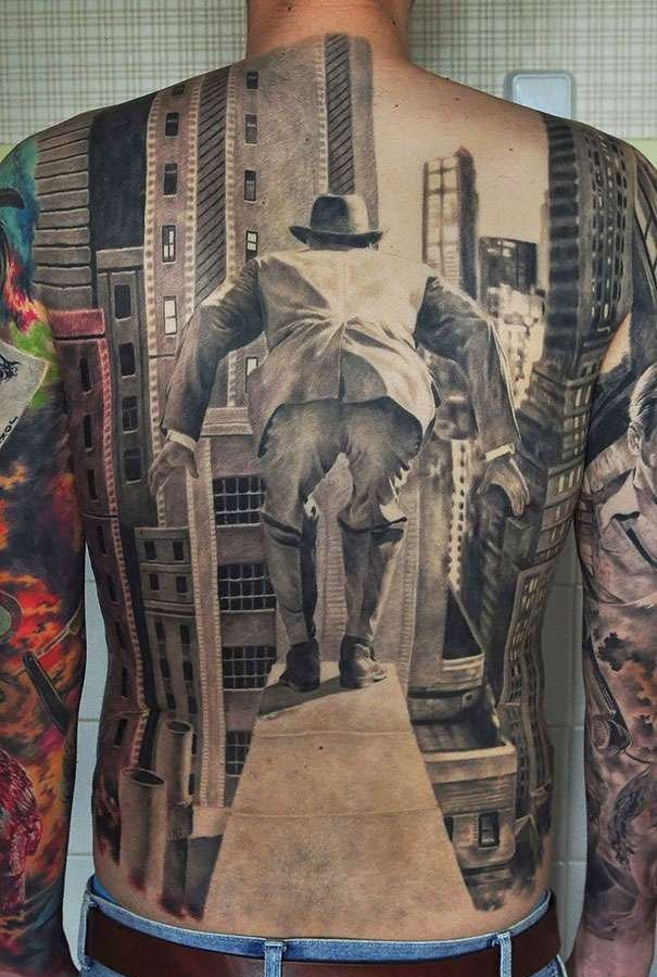 点击大图看下一张:一组让人信以为真的写实3d破皮机械纹身图案