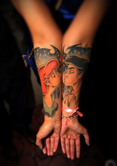 点击大图看下一张：手臂卡通组合情侣接吻纹身图案