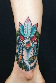女生腿部彩色大象树叶珠宝纹身图案