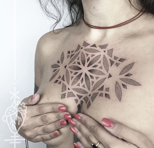 点击大图看下一张：一组黑白点刺风格简单个性线条纹身图案